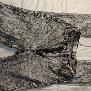 Used black and grey junior jeans
